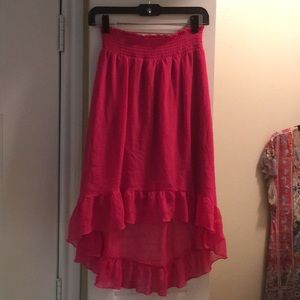 Pink high low ruffled skirt.